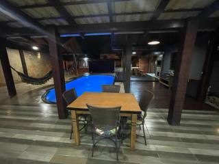 Belíssima Casa com Piscina Para Vender com 3 quartos 3 suítes no bairro Praia Alegre em Penha