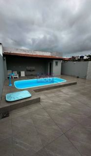 Casa com Piscina na Aruana